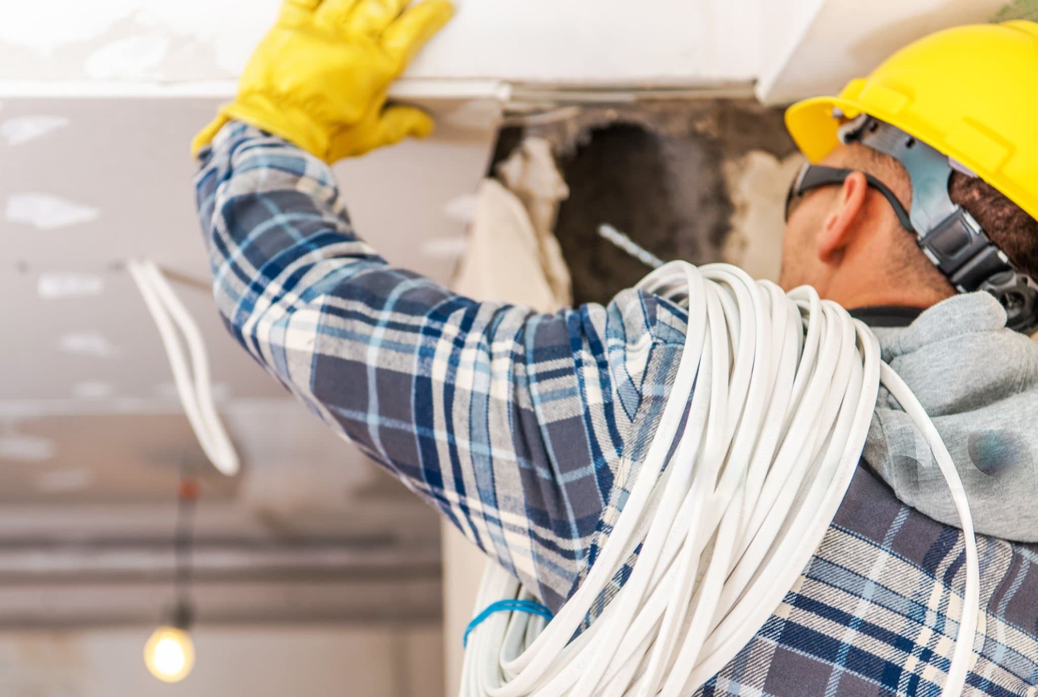 Professional electrician fixing socket outlet